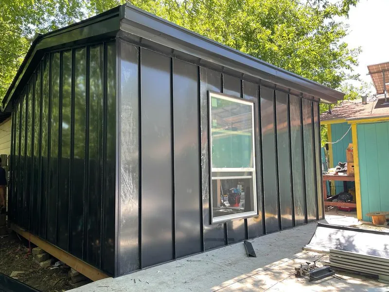 Black standing seam metal wall panels for Roof Inspection in Danbury